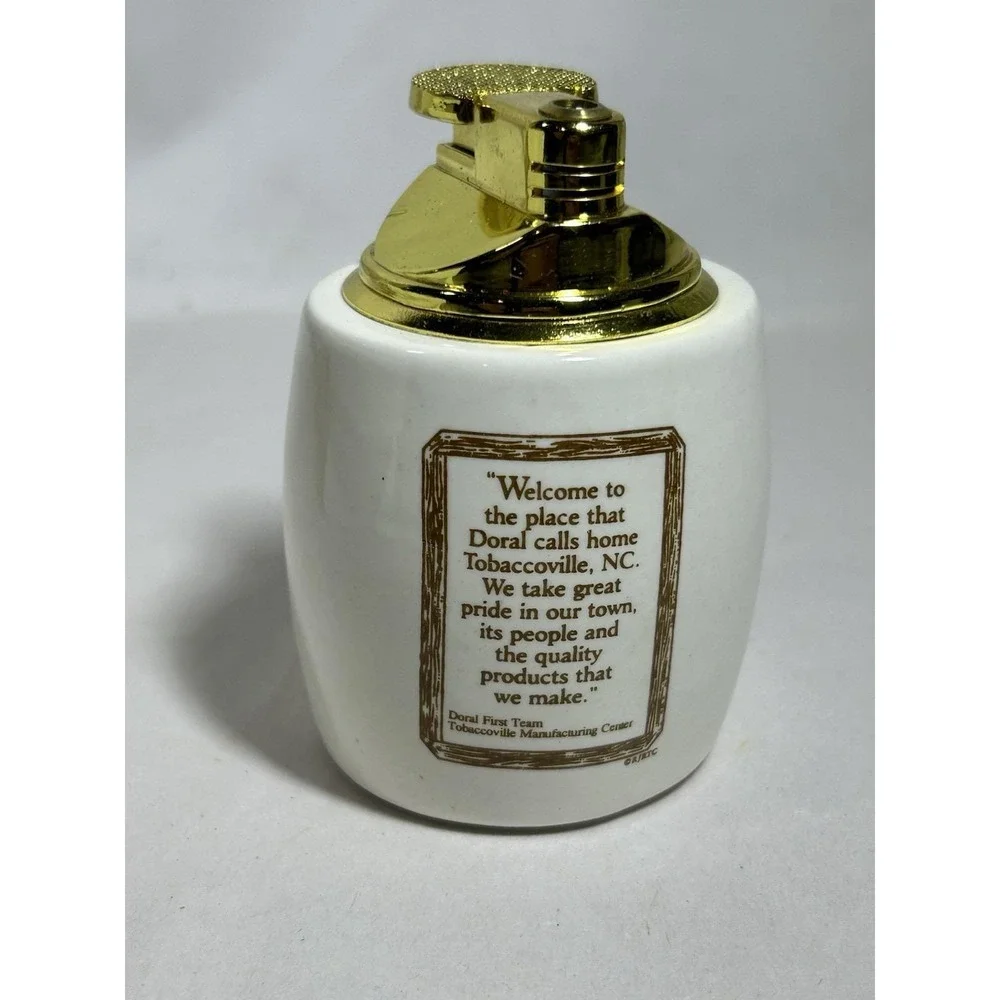 Lot of 2 Vintage Village of Tobaccoville NC North Carolina Doral Lighter NOS